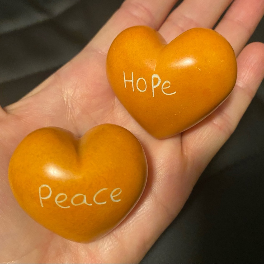Stone Hearts with Etched “Peace” and “Hope” on both sides.Approx 2” each heart.